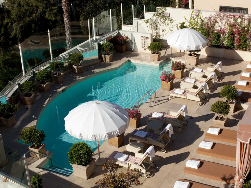 Aerial view of the rooftop pool at the Sunset Tower Hotel in West Hollywood, California.